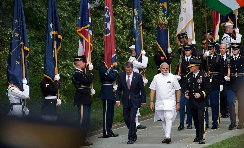 Prime Minister Narendra Modi (centre), with Secretary of Defence Ashton Carter (left), and Major General Bradley Becker (right) arrive to lay a wreath at the Tomb of the Unknowns at Arlington National Cemetery. AP
