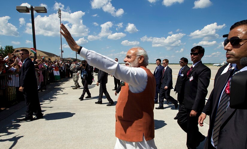 Prime Minister Narendra Modi waves to members of the indian community in Washington upon his arrival at Andrews Air Force Base. AP