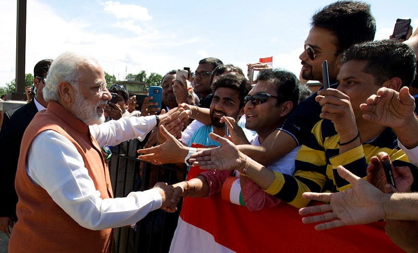 Prime Minister Narendra Modi shakes hands with members of the indian community in Washington upon his arrival at Andrews Air Force Base. AP