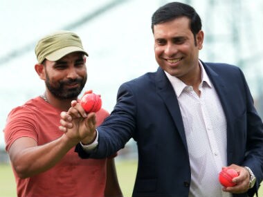 Mohammed Shami with VVS Laxman testing out the pink ball. AFP