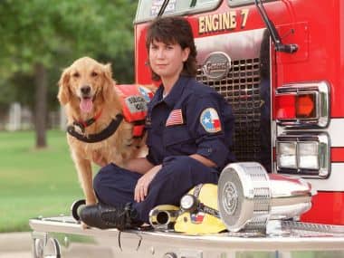 K9 Search Specialist Denise Corliss and her search dog Bretagne in Houston, Texas. AP 