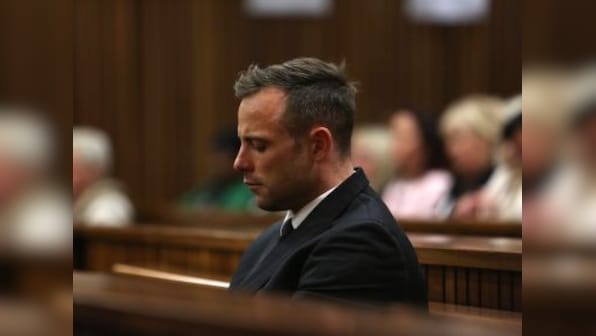 Oscar Pistorius walks without prosthetics in court to highlight disability ahead of sentencing