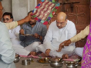 Why Amit Shah had a lot on his plate while eating at a UP Dalit's home Why Amit Shah had a lot on his plate while eating at a UP Dalit's home