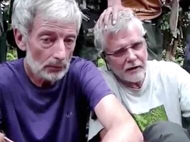 File image made from undated militant video, shows Canadians Robert Hall, left, and John Ridsdel, right. AP