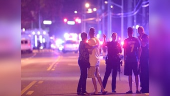 Remembering Orlando nightclub shooting: A year on, church bells toll 49 times for victims
