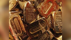 Gold futures fall by Rs 353 to Rs 41,853 per 10 gram on weak global cues as participants cut down positions