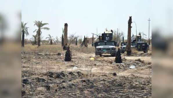 Iraqi forces unearth mass grave in IS stronghold Fallujah with over 400 bodies