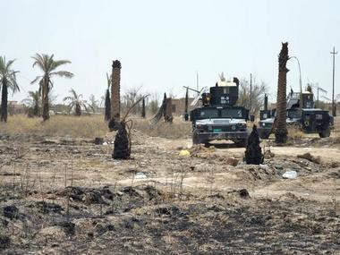 Iraqi forces unearth mass grave in IS stronghold Fallujah with over 400 bodies Iraqi forces unearth mass grave in IS stronghold Fallujah with over 400 bodies