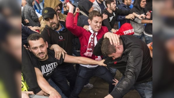 Keep it up! Russia's senior football union official tells violent fans to carry on