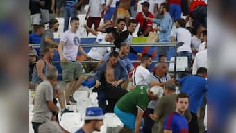 Euro 2016: UEFA to open proceedings against Russia for clashes, sports minister criticises fans