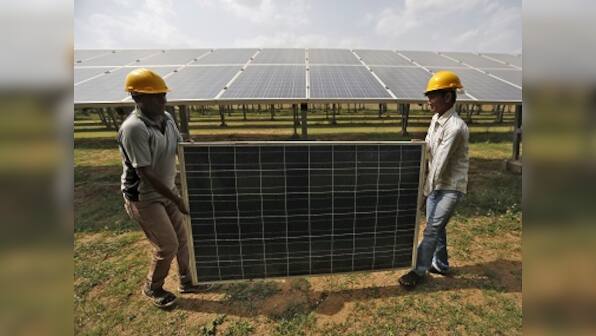 Adani Green Energy posts Rs 55 cr net profit in March quarter; revenue from power generation up by 8% at Rs 2,065 cr