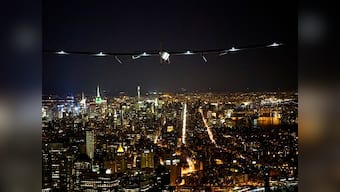 Sun-powered Solar Impulse 2 flies by Statue of Liberty, lands in New York