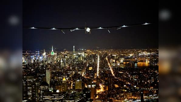 Sun-powered Solar Impulse 2 flies by Statue of Liberty, lands in New York