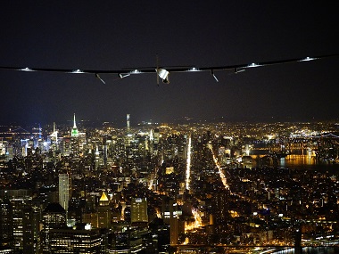 Sun-powered Solar Impulse 2 flies by Statue of Liberty, lands in New York Sun-powered Solar Impulse 2 flies by Statue of Liberty, lands in New York