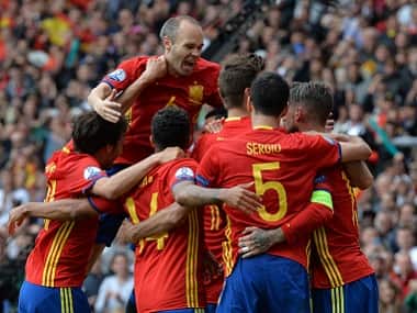 Spain's players celebrate after defender Gerard Pique's goal against Czech Republic. AFP