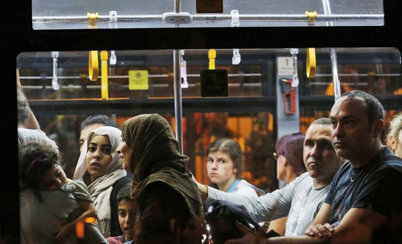 A flight's passengers leave on a bus from Istanbul's Ataturk airport, early Wednesday, June 29, 2016 following their evacuation after a blast. AP