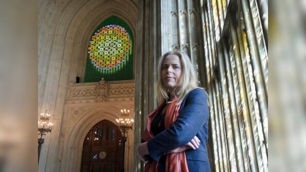 Artwork celebrating women's suffrage rights lights up UK Parliament