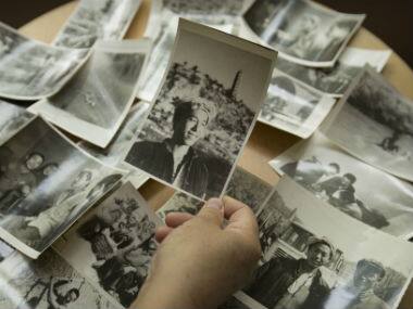 Wang Kemin holds a photo of himself. AP 