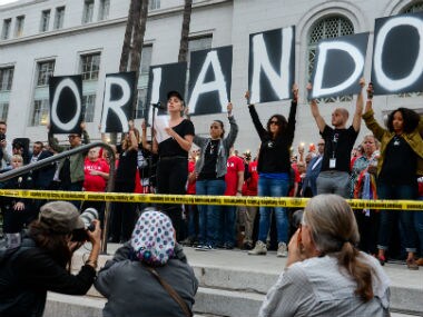 Lady Gaga gives support and reads some of the names of the victims during the Los Angeles Rally and Vigil for Orlando at Los Angeles City Hall. AP