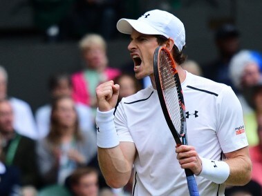 Andy Murray celebrates winning a point against Nick Kyrgios at Wimbledon. AFP