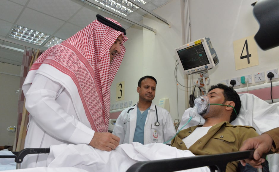 Saudi Emir of Medina Prince Faisal bin Salman bin Abdulaziz (L) visits an injured policeman at a local hospital after the suicide attack. Four Saudi security personnel were killed and five others were wounded in a suicide bombing on Mosque in Medina, the interior ministry said. Photo Courtesy: AFP Saudi Emir of Medina Prince Faisal bin Salman bin Abdulaziz (L) visits an injured policeman at a local hospital after the suicide attack. Four Saudi security personnel were killed and five others were wounded in a suicide bombing on Mosque in Medina, the interior ministry said. Photo Courtesy: AFP