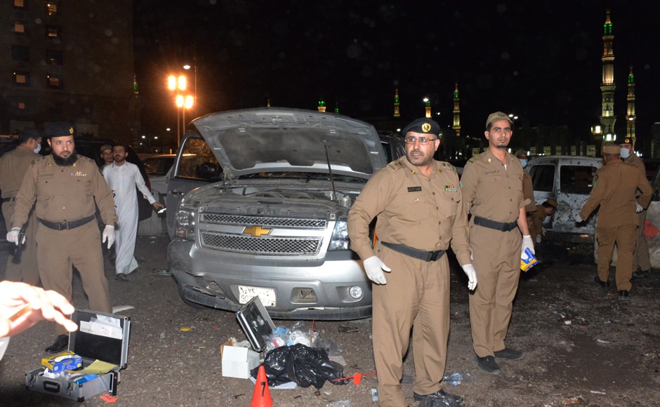 Saudi security personnel gather at the site of the suicide attack near the security headquarters of the Prophet's Mosque in Medina City on 4 July, 2016. Photo Courtesy: AFP Saudi security personnel gather at the site of the suicide attack near the security headquarters of the Prophet's Mosque in Medina City on 4 July, 2016. Photo Courtesy: AFP