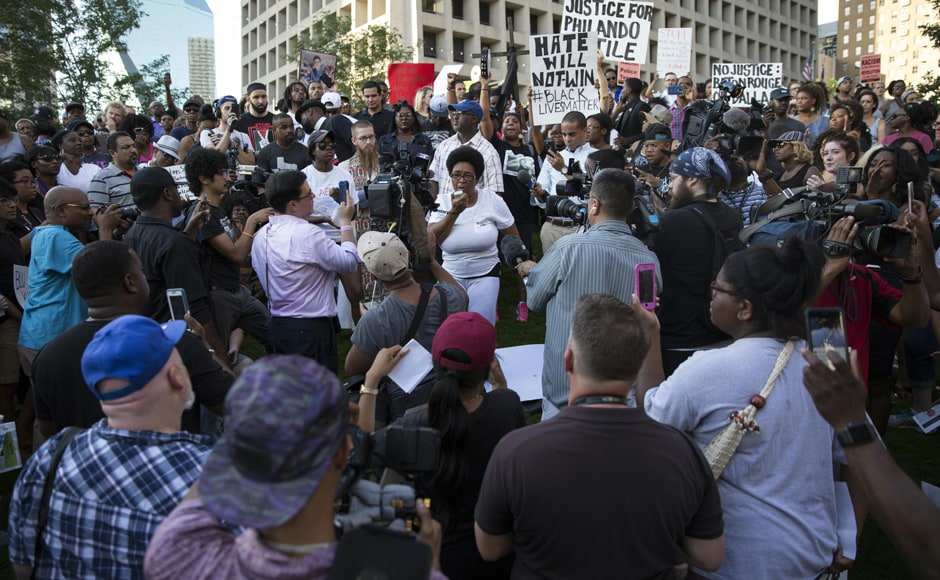 Governor Mark Dayton pledged to push for a full and independent inquiry by the Department of Justice -- which is already investigating the police shooting of a black man caught on video two days earlier in Louisiana. AFP Governor Mark Dayton pledged to push for a full and independent inquiry by the Department of Justice -- which is already investigating the police shooting of a black man caught on video two days earlier in Louisiana. AFP