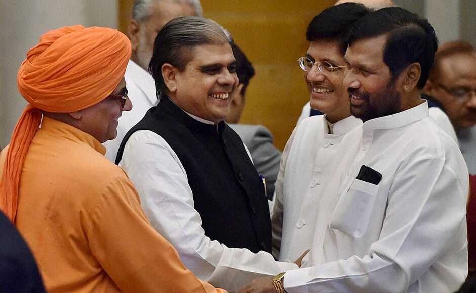 Union Power and Coal Minister Piyush Goyal with minister for Food and Public Distribution Ram Vilas Paswan and MoS for Home Affairs Haribhai Parthibhai Chaudhary at the swearing-in ceremony at Rashtrapati Bhavan in New Delhi on Tuesday. PTI Union Power and Coal Minister Piyush Goyal with minister for Food and Public Distribution Ram Vilas Paswan and MoS for Home Affairs Haribhai Parthibhai Chaudhary at the swearing-in ceremony at Rashtrapati Bhavan in New Delhi on Tuesday. PTI