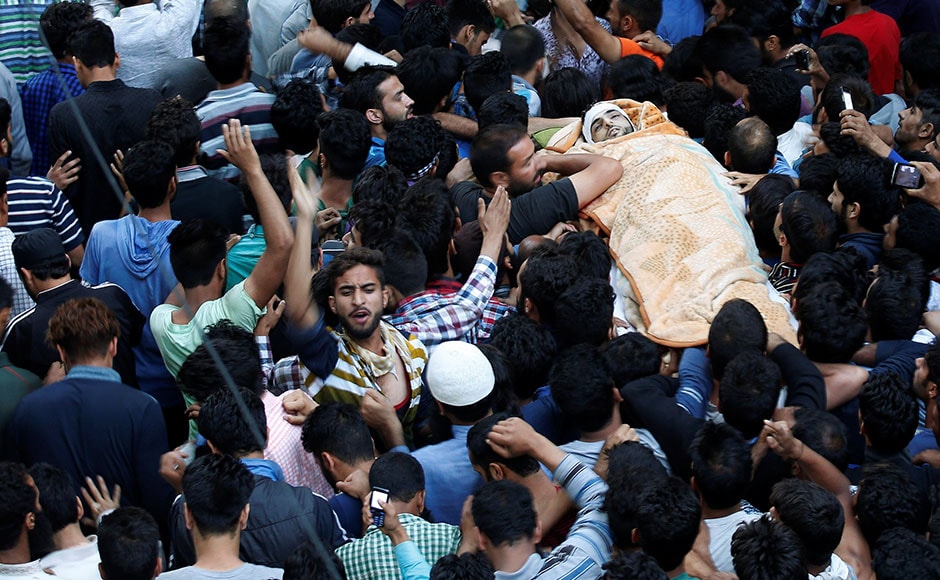 Kashmiri Muslims carry the body of Burhan Wani, a separatist militant leader, during his funeral in Tral, south of Srinagar on Saturday. Wani, 21, was killed on Friday along with two accomplices in a gunbattle with a joint force of army and police personnel at Kokernag area, 83 kms from Srinagar. Reuters Kashmiri Muslims carry the body of Burhan Wani, a separatist militant leader, during his funeral in Tral, south of Srinagar on Saturday. Wani, 21, was killed on Friday along with two accomplices in a gunbattle with a joint force of army and police personnel at Kokernag area, 83 kms from Srinagar. Reuters