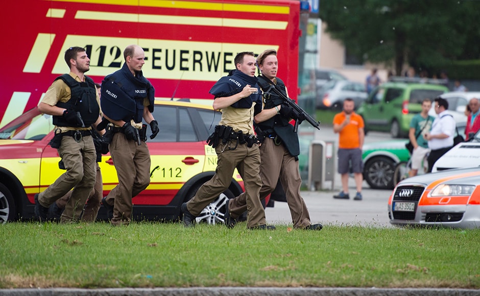 Police in Munich, Germany respond to a shooting at a shopping center in the city on Friday. Cops confirmed that shots were fired at Olympia Einkaufszentrum shopping center. At least eight people have been confirmed dead but the number of injured is yet to be ascertained. DPA via AP Police in Munich, Germany respond to a shooting at a shopping center in the city on Friday. Cops confirmed that shots were fired at Olympia Einkaufszentrum shopping center. At least eight people have been confirmed dead but the number of injured is yet to be ascertained. DPA via AP