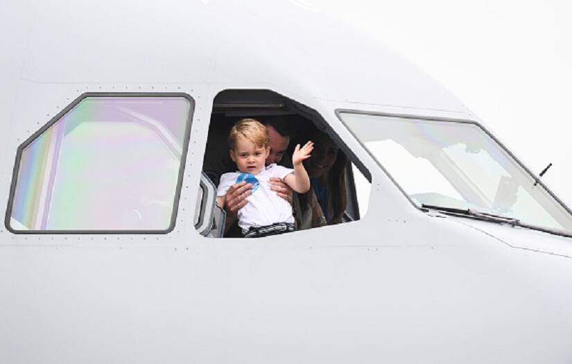 FAIRFORD, ENGLAND - JULY 08: Prince George of Cambridge waves from the cockpit of a plane as he attends the The Royal International Air Tattoo at RAF Fairford on July 8, 2016 in Fairford, England. (Photo by Samir Hussein/WireImage)