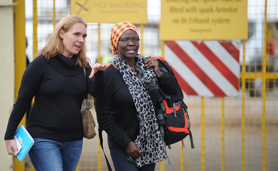 Aid workers in Juba arrive in Nairobi, Kenya. Commercial flights to Juba remain cancelled though charter flights are evacuating hundreds of aid workers and other foreign citizens from the capital. The U.S. military in Africa says it has sent 40 additional soldiers to Juba, to help secure American personnel and facilities in the war-torn city. AP Aid workers in Juba arrive in Nairobi, Kenya. Commercial flights to Juba remain cancelled though charter flights are evacuating hundreds of aid workers and other foreign citizens from the capital. The U.S. military in Africa says it has sent 40 additional soldiers to Juba, to help secure American personnel and facilities in the war-torn city. AP