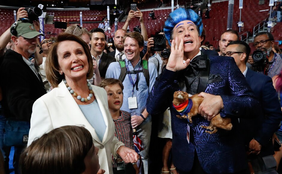 House Minority Leader Nancy Pelosi, D-Calif., left, listens while comedian Stephen Colbert records a programme on Sunday before the DNC kicked off. In June, Pelosi had endorsed Clinton for president. AP House Minority Leader Nancy Pelosi, D-Calif., left, listens while comedian Stephen Colbert records a programme on Sunday before the DNC kicked off. In June, Pelosi had endorsed Clinton for president. AP