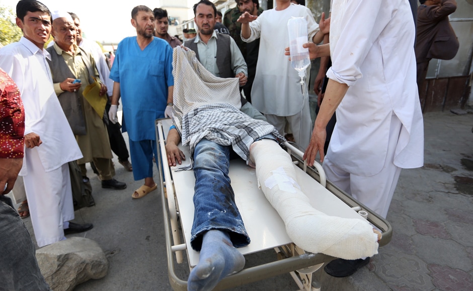 Afghans help an injured man after an explosion struck a protest in Kabul, Afghanistan, Saturday, July 23, 2016. Witnesses in Kabul say that an explosion struck the protest march by held largely by members of Afghanistan’s Shiite Hazara ethnic minority group, demanding that a major regional electric power line be routed through their impoverished home province. AP Afghans help an injured man after an explosion struck a protest in Kabul, Afghanistan, Saturday, July 23, 2016. Witnesses in Kabul say that an explosion struck the protest march by held largely by members of Afghanistan’s Shiite Hazara ethnic minority group, demanding that a major regional electric power line be routed through their impoverished home province. AP