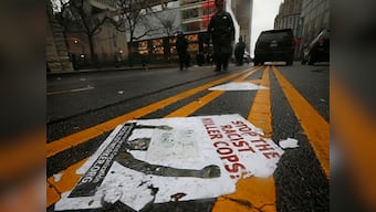 Seven Chicago cops to face firing over black teen Laquan McDonald's shooting death