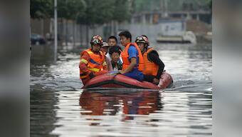 China floods: Over 250 feared dead in heavy rains and floods