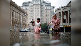 Over 225 killed or missing, thousands evacuated as heavy floods lash China