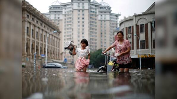 Over 225 killed or missing, thousands evacuated as heavy floods lash China