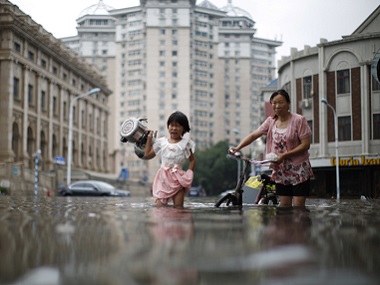 Over 225 killed or missing, thousands evacuated as heavy floods lash China Over 225 killed or missing, thousands evacuated as heavy floods lash China