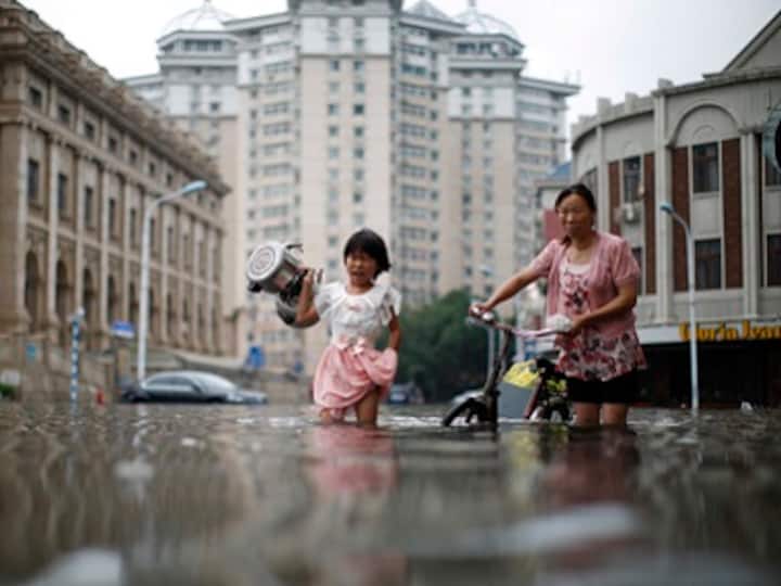 Over 225 killed or missing, thousands evacuated as heavy floods lash China
