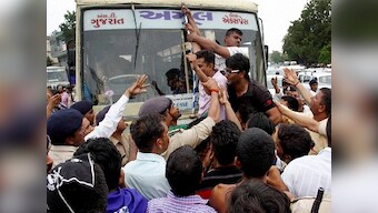 Protests by Dalits in Gujarat escalate; Opposition raises issue in Parliament