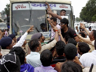 Protests by Dalits in Gujarat escalate; Opposition raises issue in Parliament Protests by Dalits in Gujarat escalate; Opposition raises issue in Parliament