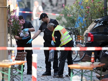 Germany wary of backlash against migrants following week of bloodshed Germany wary of backlash against migrants following week of bloodshed