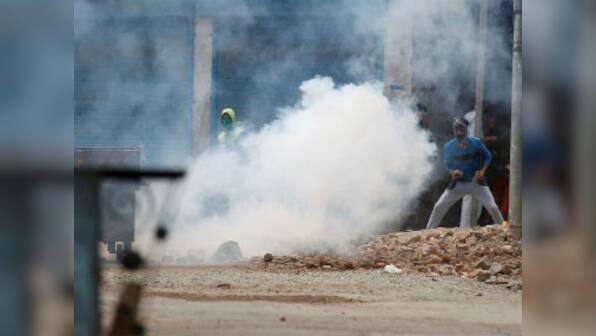 Curfew in Kashmir for the 5th day as mob torches police van, beats cop's family