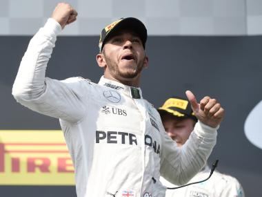 Lewis Hamilton celebrates winning the Hungarian Grand Prix. AP