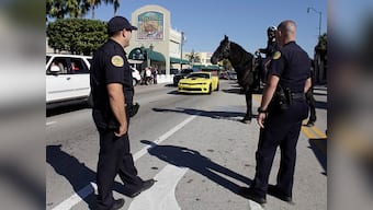 Miami Police shoot unarmed black man as he lies on street with hands up