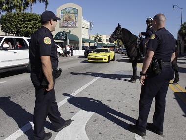 Miami Police shoot unarmed black man as he lies on street with hands up Miami Police shoot unarmed black man as he lies on street with hands up