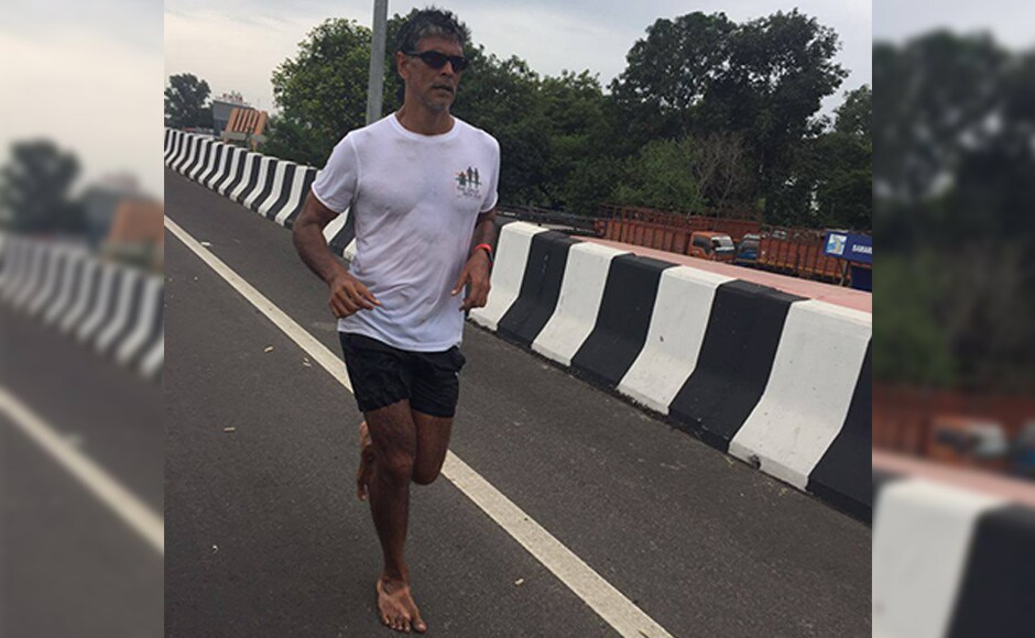 milind soman running slippers