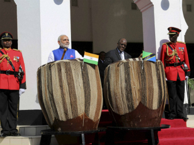 PM Modi and Magufuli beat the traditional drums enthralling Tanzanians PM Modi and Magufuli beat the traditional drums enthralling Tanzanians