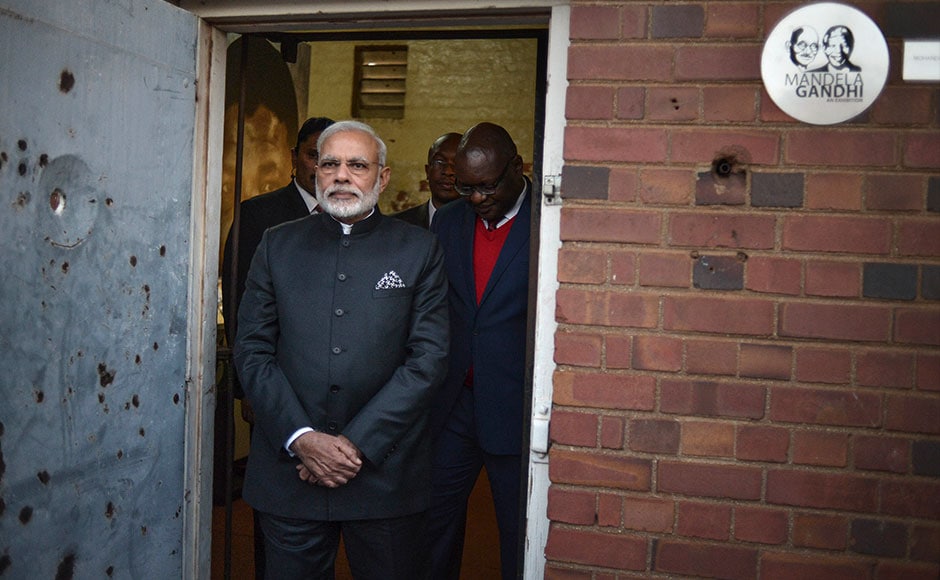 PM Narendra Modi visits the Constitutional Hill in Johannesburg , where Indian independence hero Mahatma Gandhi and South African former president and liberation icon Nelson Mandela were kept in prison. AFP PM Narendra Modi visits the Constitutional Hill in Johannesburg , where Indian independence hero Mahatma Gandhi and South African former president and liberation icon Nelson Mandela were kept in prison. AFP